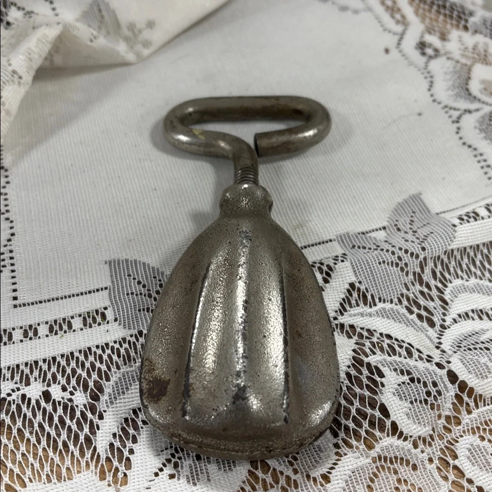 antique cast-iron screw-type nutcracker